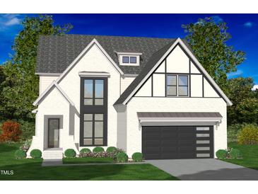 Two-story house with white exterior, black garage door, and landscaping at 8713 Little Deer Ln, Raleigh, NC 27613
