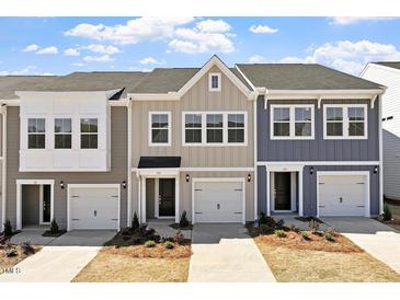 Beautiful new townhomes, with attached garages and sidewalks, are surrounded by expertly landscaped gardens at 115 Central Townes Way # 300, Raleigh, NC 27603