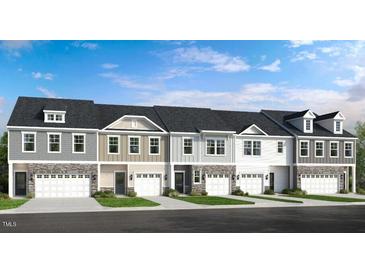 Five-unit townhome building with attached garages and landscaping at 274 Sweetbay Tree Dr, Wendell, NC 27591
