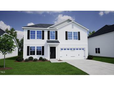 Two-story home with white siding, black accents, and a two-car garage at 211 Grove Township Way, Angier, NC 27501