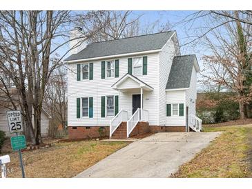 Two-story house with white siding, brick base, and a driveway at 5321 Baywood Forest Dr, Knightdale, NC 27545