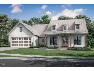 Craftsman style home with metal roof, two-car garage, and front porch at Lot 1H Sheep Pasture Rd, Spring Hope, NC 27882