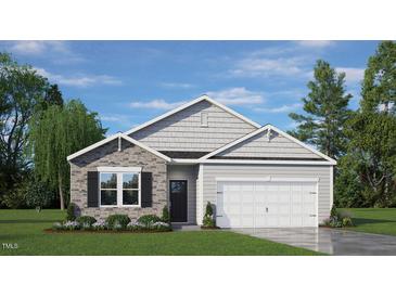 One-story home with gray siding, stone accents, and a two-car garage at 1113 Middlecrest Dr, Rocky Mount, NC 27804