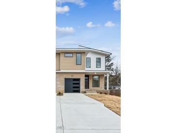 Modern two-story townhome with attached garage and landscaping at 808 Culpepper Ln, Raleigh, NC 27610