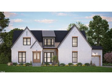 Two-story white brick home with a black roof and landscaping at 20 Lila Dr, Pittsboro, NC 27312