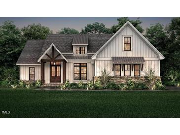 Craftsman style home with a welcoming front porch and stone accents at 2801 Mount View Church Rd, Moncure, NC 27559