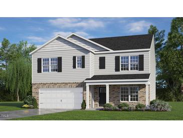 Two-story house with gray siding, brick accents, and a two-car garage at 180 Paper Birch Way, Fuquay Varina, NC 27526