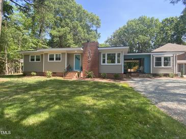 Updated Ranch home with a charming front porch and landscaped lawn at 106 Williams St # 106 106 A 106 B, Carrboro, NC 27510