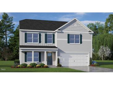 Two-story house with gray siding, dark green shutters, and a white double garage door at 192 Paper Birch Way, Fuquay Varina, NC 27526