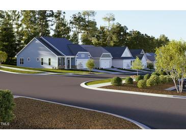 Charming new construction homes featuring various exterior designs and well-maintained landscaping at 209 Meadowbark Bnd # 20, Garner, NC 27529