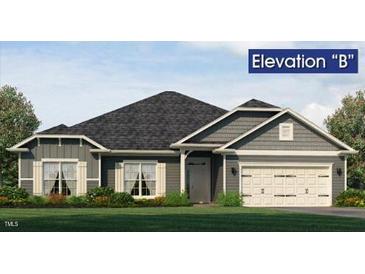 Gray exterior with white accents and a two-car garage at 565 Sweet Potato Lane # 07, Nashville, NC 27856