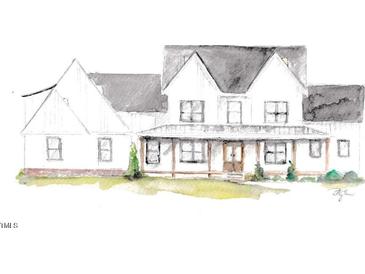 Charming home features a welcoming front porch, classic architectural details, and beautifully landscaped surroundings at 975 Wilbon Rd, Holly Springs, NC 27540