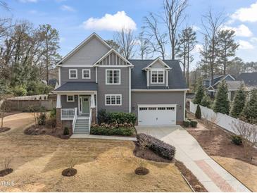 Beautiful two-story home featuring manicured landscaping and an attached two-car garage at 215 W Delafield Ave, Durham, NC 27704