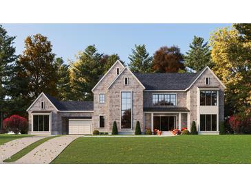 Charming two-story home with cedar shake siding, a shingle roof, and a well-manicured lawn at 214 Reynolds Rd, Raleigh, NC 27609