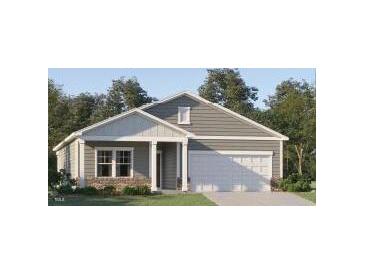Charming single-story home with gray siding, white trim, covered entry, and attached two-car garage at 532 Morning Light Dr, Angier, NC 27501