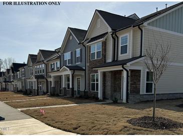 Charming two-story townhomes featuring varied color schemes, covered front porches and well manicured lawns in an attractive community at 945 Alma Railway Dr # 559, Wake Forest, NC 27587