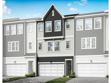 New construction three-story home with attached two-car garage and inviting exterior at 2021 Trident Maple Ln, Chapel Hill, NC 27517