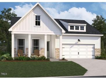Charming craftsman-style home with white siding, stone accents, two-car garage, and inviting front porch seating at 104 N Stonemill Trl # Homesite 253, Clayton, NC 27520