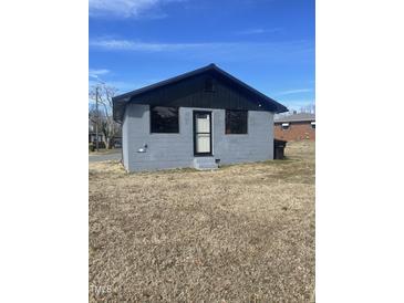 Charming single-story home features a newer roof and windows, ready for renovation and personalization at 1204 Avondale Dr, Burlington, NC 27217