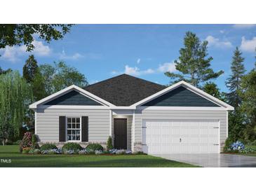 Charming single-story home with gray siding, black door, black shutters, attached garage, and well-manicured landscaping at 425 Citron St, Sanford, NC 27332