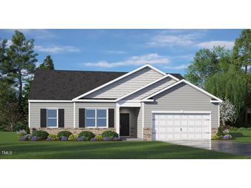 Charming single Gathering home featuring stone accents, gray siding, and a two car garage at 921 Canis Minor Rd, Wendell, NC 27591