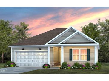 Charming single-story home showcasing classic architectural details and a well-manicured lawn at 345 Broomside Ave, Raleigh, NC 27603