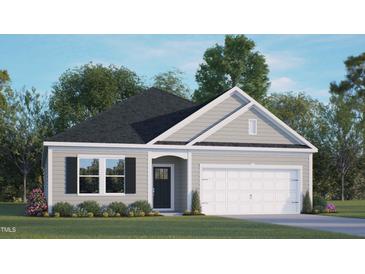 Charming single-story home with gray siding, a two-car garage, and professionally landscaped front yard at 160 Scenic Rock Dr, Youngsville, NC 27596