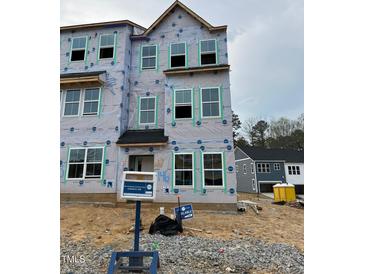 Exterior view of home under construction highlighting window placement and future architectural style at 304 Chesapeak Commons St # 146, Garner, NC 27529