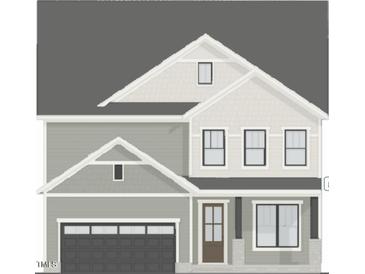 Charming two-story home with attached garage and covered front porch, showcasing a classic design and curb appeal at 268 Murray Grey Ln, Wake Forest, NC 27587