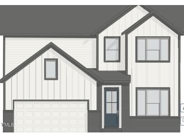 New construction showing exterior elevation with two-car garage and modern windows at 412 Marthas View Way Way, Wake Forest, NC 27587
