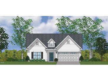 Charming single-Gathering home featuring a classic design, attached garage, and a well-manicured lawn at 2732 Lacy Holt Rd, Graham, NC 27253