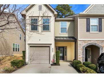 Charming two-story townhome with attached garage and landscaped front yard in a desirable neighborhood at 2901 Benevolence Dr, Raleigh, NC 27610