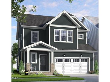Charming two-story home with a covered front porch, attached two-car garage, and beautiful architectural details at 264 Beacon Dr, Pittsboro, NC 27312