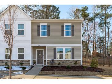 Charming two-story home with stone accents and well-maintained landscaping at 2440 Tonoloway Dr, Raleigh, NC 27610