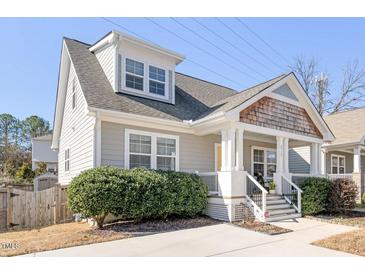 Charming home with a classic front porch and well-maintained landscaping at 2715 Edmund St, Durham, NC 27705