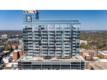 Modern high rise with balconies and rooftop pool offering upscale city living with fantastic views at 301 Fayetteville St # 3205, Raleigh, NC 27601
