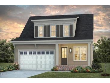 Charming single-Gathering home featuring neutral colors, a two-car garage, and a welcoming front porch at 1800 Bright Lantern Way, Wendell, NC 27591