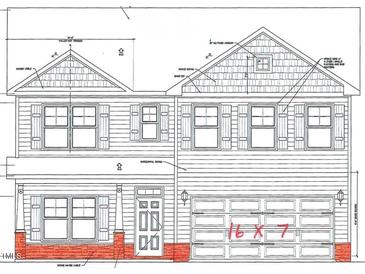 Two-story home featuring horizontal siding, shake siding, shutters, a garage, and a brick water table at 85 Malbec Way, Youngsville, NC 27596