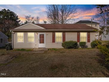 Charming single-story home featuring a well-maintained lawn and a cozy entrance, ready for new memories at 629 Martin St, Durham, NC 27704