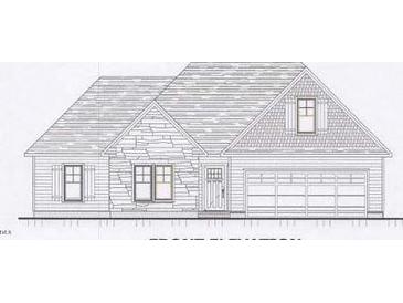 Charming single-Gathering home featuring a two-car garage, stone accents, and a welcoming front entry at 228 Hillwood Dr, Sanford, NC 27332