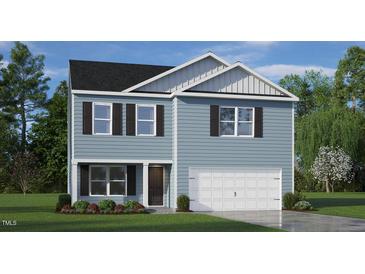 Charming two-story home featuring light blue siding, black shutters, and a two-car garage at 6045 Sodium St, Raleigh, NC 27610