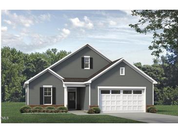 Charming home with gray siding, white trim, a black front door, and an attached garage at 133 Oban Dr, Homesite 151, Sanford, NC 27330