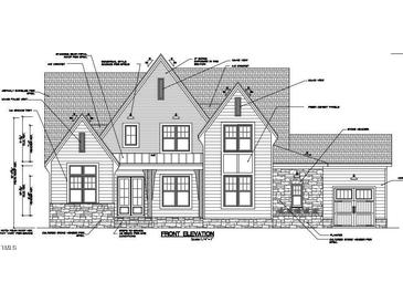 Front elevation featuring stone accents, industrial style sconces and fiber cement panels at 5200 Bent Leaf Dr, Raleigh, NC 27606