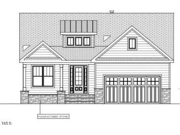 Charming single-Gathering home with a two-car garage and stone accents at 816 Hanson Rd, Durham, NC 27713