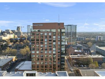 An eye-level view of the Quorum Center and surrounding city buildings showcases a high-rise urban living experience at 122 N Harrington St # 1025, Raleigh, NC 27603