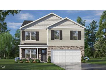 Charming two-story home with stone accents, neutral siding, and a well-manicured front yard at 117 Pisgah St, Sanford, NC 27330