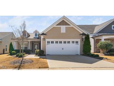 Attractive single Gathering home with a two-car garage and well-maintained landscaping at 216 Kalmia Dr, Durham, NC 27703