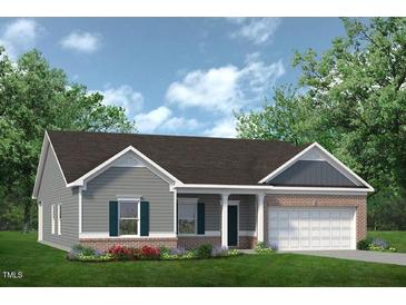 Charming single-story home with a brick foundation and gray siding at 4879 Pioneer Dr, Sanford, NC 27330