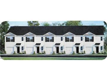 Charming townhomes with white exteriors, black roofs, and individual garages, providing a modern and stylish look at 521 Fife Ct, Gibsonville, NC 27249