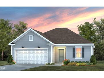 Charming single-story home featuring light gray siding, a front-facing garage, and a landscaped yard at 784 Ben Ledi Ct, Raleigh, NC 27603